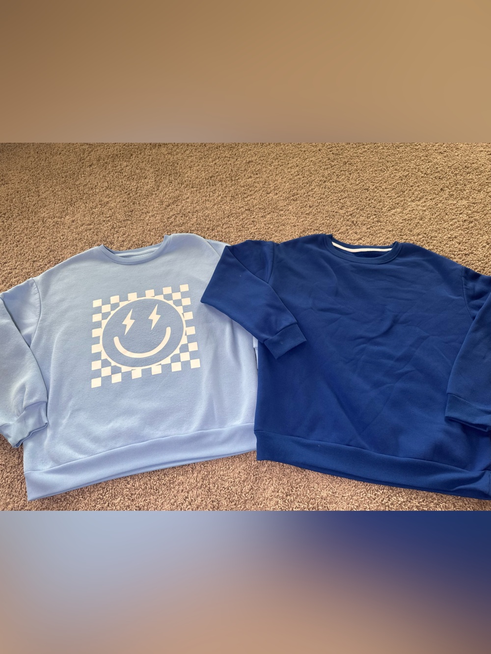 Women’s Light Blue Smile Graphic Sweatshirt pair